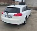 Белый Опель Инсигния, объемом двигателя 1.96 л и пробегом 264 тыс. км за 6400 $, фото 3 на Automoto.ua