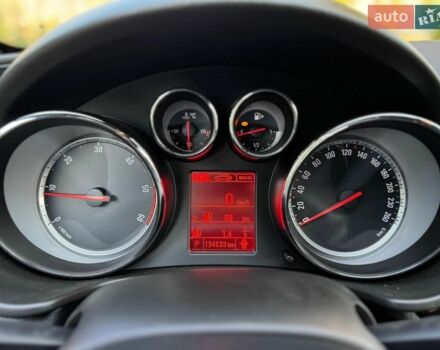 Белый Опель Инсигния, объемом двигателя 2 л и пробегом 130 тыс. км за 9300 $, фото 11 на Automoto.ua