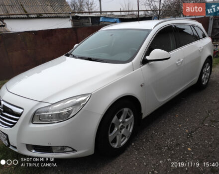Белый Опель Инсигния, объемом двигателя 2 л и пробегом 186 тыс. км за 9500 $, фото 2 на Automoto.ua