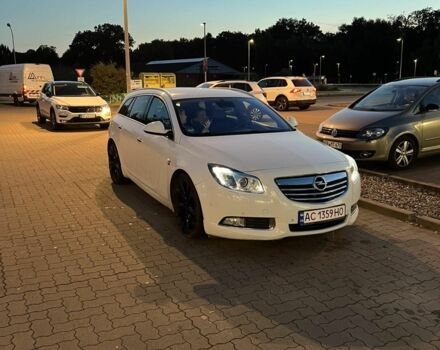 Білий Опель Інсігнія, об'ємом двигуна 2 л та пробігом 325 тис. км за 7600 $, фото 3 на Automoto.ua