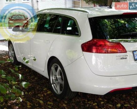 Білий Опель Інсігнія, об'ємом двигуна 1.96 л та пробігом 270 тис. км за 7700 $, фото 2 на Automoto.ua