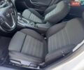 Білий Опель Інсігнія, об'ємом двигуна 2 л та пробігом 256 тис. км за 7999 $, фото 12 на Automoto.ua