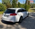 Білий Опель Інсігнія, об'ємом двигуна 2 л та пробігом 256 тис. км за 7999 $, фото 16 на Automoto.ua