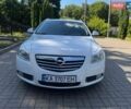 Білий Опель Інсігнія, об'ємом двигуна 2 л та пробігом 256 тис. км за 7999 $, фото 1 на Automoto.ua