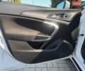 Білий Опель Інсігнія, об'ємом двигуна 2 л та пробігом 256 тис. км за 7999 $, фото 10 на Automoto.ua