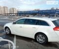 Білий Опель Інсігнія, об'ємом двигуна 2 л та пробігом 250 тис. км за 7750 $, фото 4 на Automoto.ua