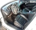 Білий Опель Інсігнія, об'ємом двигуна 2 л та пробігом 250 тис. км за 7750 $, фото 11 на Automoto.ua
