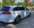 Білий Опель Інсігнія, об'ємом двигуна 2 л та пробігом 256 тис. км за 7999 $, фото 5 на Automoto.ua
