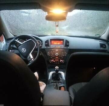 Білий Опель Інсігнія, об'ємом двигуна 1.96 л та пробігом 318 тис. км за 7000 $, фото 14 на Automoto.ua