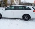Білий Опель Інсігнія, об'ємом двигуна 2 л та пробігом 245 тис. км за 8299 $, фото 7 на Automoto.ua
