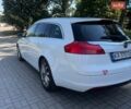 Білий Опель Інсігнія, об'ємом двигуна 2 л та пробігом 256 тис. км за 7999 $, фото 3 на Automoto.ua