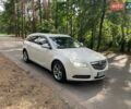 Белый Опель Инсигния, объемом двигателя 2 л и пробегом 305 тыс. км за 8600 $, фото 1 на Automoto.ua