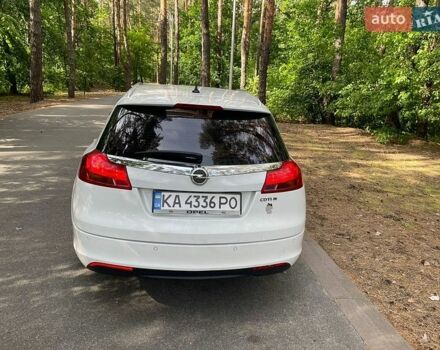 Белый Опель Инсигния, объемом двигателя 2 л и пробегом 305 тыс. км за 8600 $, фото 4 на Automoto.ua