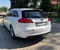 Білий Опель Інсігнія, об'ємом двигуна 2 л та пробігом 256 тис. км за 7999 $, фото 15 на Automoto.ua