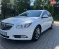 Білий Опель Інсігнія, об'ємом двигуна 2 л та пробігом 256 тис. км за 7999 $, фото 2 на Automoto.ua