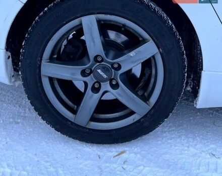 Белый Опель Инсигния, объемом двигателя 1.96 л и пробегом 326 тыс. км за 7600 $, фото 19 на Automoto.ua