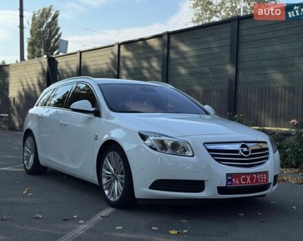 Белый Опель Инсигния, объемом двигателя 2 л и пробегом 130 тыс. км за 9300 $, фото 36 на Automoto.ua