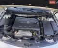 Білий Опель Інсігнія, об'ємом двигуна 2 л та пробігом 256 тис. км за 7999 $, фото 6 на Automoto.ua