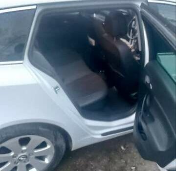 Білий Опель Інсігнія, об'ємом двигуна 1.96 л та пробігом 318 тис. км за 7000 $, фото 11 на Automoto.ua