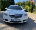 Білий Опель Інсігнія, об'ємом двигуна 2 л та пробігом 256 тис. км за 7999 $, фото 20 на Automoto.ua