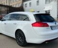 Білий Опель Інсігнія, об'ємом двигуна 2 л та пробігом 229 тис. км за 9900 $, фото 7 на Automoto.ua
