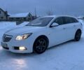 Белый Опель Инсигния, объемом двигателя 2 л и пробегом 326 тыс. км за 7600 $, фото 1 на Automoto.ua