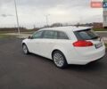 Білий Опель Інсігнія, об'ємом двигуна 1.96 л та пробігом 265 тис. км за 10300 $, фото 16 на Automoto.ua