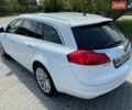 Білий Опель Інсігнія, об'ємом двигуна 2 л та пробігом 238 тис. км за 8900 $, фото 5 на Automoto.ua
