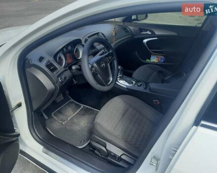 Білий Опель Інсігнія, об'ємом двигуна 1.96 л та пробігом 210 тис. км за 9500 $, фото 6 на Automoto.ua