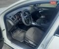Білий Опель Інсігнія, об'ємом двигуна 1.96 л та пробігом 210 тис. км за 9500 $, фото 6 на Automoto.ua