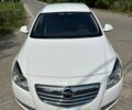 Білий Опель Інсігнія, об'ємом двигуна 2 л та пробігом 238 тис. км за 8900 $, фото 2 на Automoto.ua