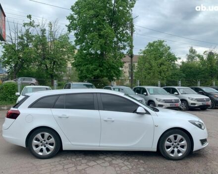 Белый Опель Инсигния, объемом двигателя 2 л и пробегом 241 тыс. км за 10290 $, фото 3 на Automoto.ua