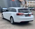 Белый Опель Инсигния, объемом двигателя 2 л и пробегом 241 тыс. км за 10290 $, фото 6 на Automoto.ua