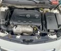 Білий Опель Інсігнія, об'ємом двигуна 1.96 л та пробігом 265 тис. км за 10300 $, фото 3 на Automoto.ua
