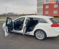 Білий Опель Інсігнія, об'ємом двигуна 1.96 л та пробігом 265 тис. км за 10300 $, фото 15 на Automoto.ua