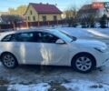 Белый Опель Инсигния, объемом двигателя 2 л и пробегом 261 тыс. км за 7800 $, фото 3 на Automoto.ua