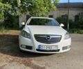 Белый Опель Инсигния, объемом двигателя 2 л и пробегом 303 тыс. км за 5900 $, фото 1 на Automoto.ua