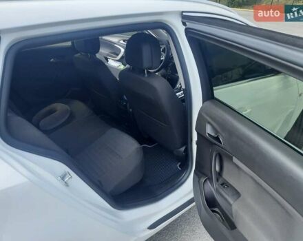 Білий Опель Інсігнія, об'ємом двигуна 1.96 л та пробігом 210 тис. км за 9500 $, фото 9 на Automoto.ua