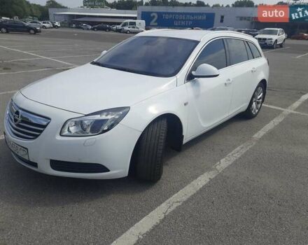 Білий Опель Інсігнія, об'ємом двигуна 1.96 л та пробігом 210 тис. км за 9500 $, фото 1 на Automoto.ua