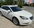 Білий Опель Інсігнія, об'ємом двигуна 2 л та пробігом 238 тис. км за 8900 $, фото 1 на Automoto.ua
