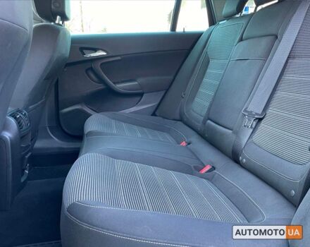 Белый Опель Инсигния, объемом двигателя 2 л и пробегом 292 тыс. км за 9400 $, фото 14 на Automoto.ua