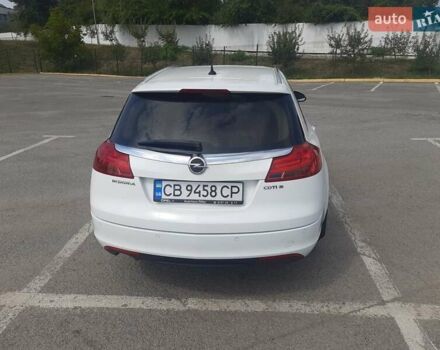 Білий Опель Інсігнія, об'ємом двигуна 1.96 л та пробігом 210 тис. км за 9500 $, фото 4 на Automoto.ua