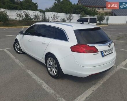 Білий Опель Інсігнія, об'ємом двигуна 1.96 л та пробігом 210 тис. км за 9500 $, фото 5 на Automoto.ua