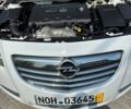 Білий Опель Інсігнія, об'ємом двигуна 2 л та пробігом 238 тис. км за 8900 $, фото 10 на Automoto.ua