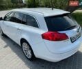 Білий Опель Інсігнія, об'ємом двигуна 2 л та пробігом 238 тис. км за 9300 $, фото 5 на Automoto.ua