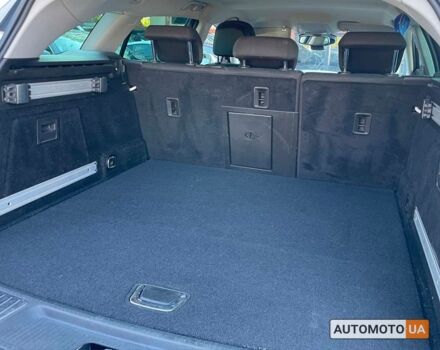 Белый Опель Инсигния, объемом двигателя 2 л и пробегом 292 тыс. км за 9400 $, фото 6 на Automoto.ua