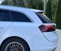 Білий Опель Інсігнія, об'ємом двигуна 2 л та пробігом 348 тис. км за 8999 $, фото 6 на Automoto.ua