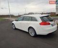 Білий Опель Інсігнія, об'ємом двигуна 1.96 л та пробігом 265 тис. км за 10300 $, фото 16 на Automoto.ua