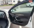 Білий Опель Інсігнія, об'ємом двигуна 1.96 л та пробігом 265 тис. км за 10300 $, фото 32 на Automoto.ua
