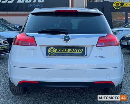 Белый Опель Инсигния, объемом двигателя 2 л и пробегом 292 тыс. км за 9400 $, фото 4 на Automoto.ua